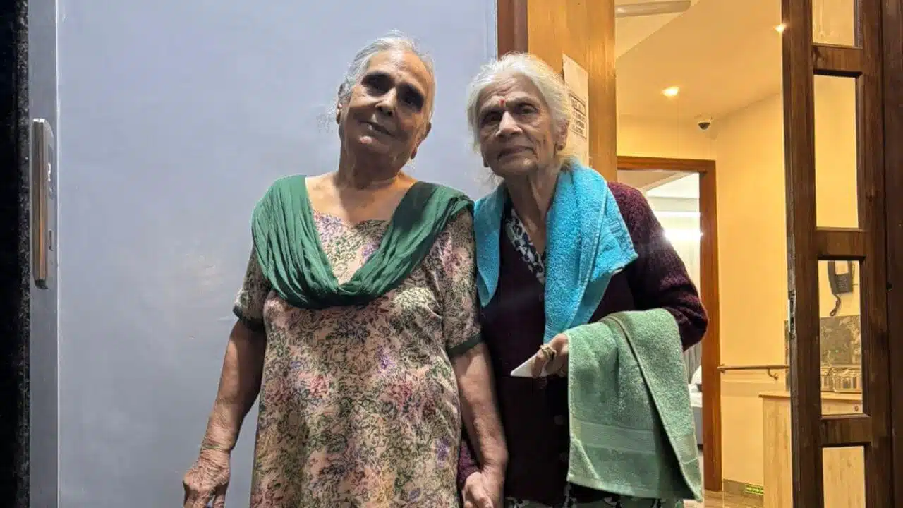 Caregiver assisting a senior during post-operative recovery at Gracias Living