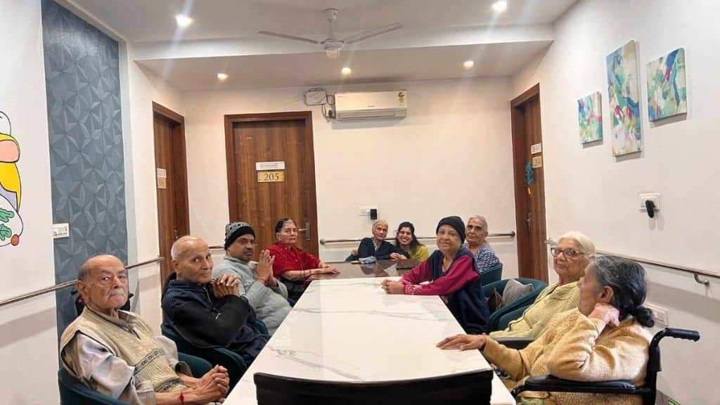 Elderly individuals in a dementia care facility in Delhi NCR, receiving social and emotional support