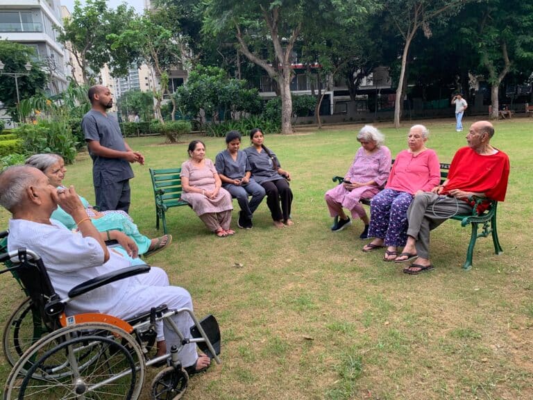 Demntia Residents at Gracias Living enjoying Sitting in the park