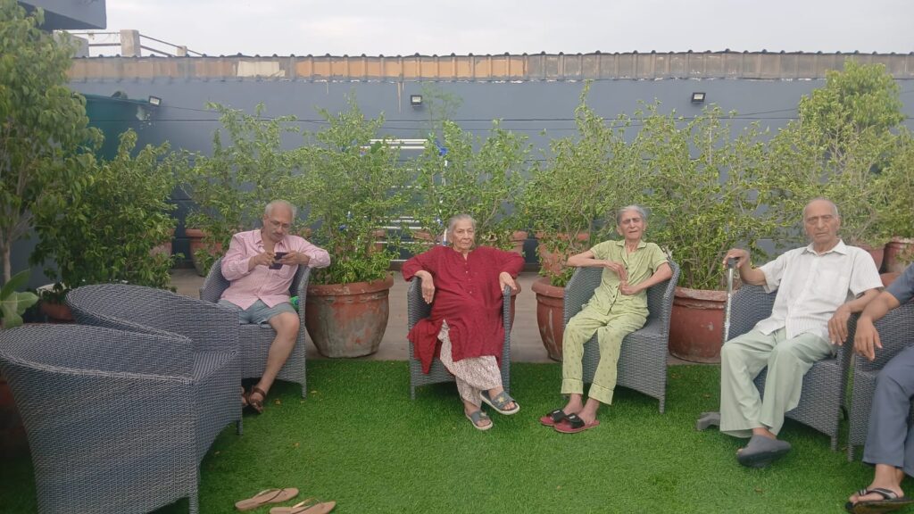 Seniors at the terrace Garden of Gracias Living
